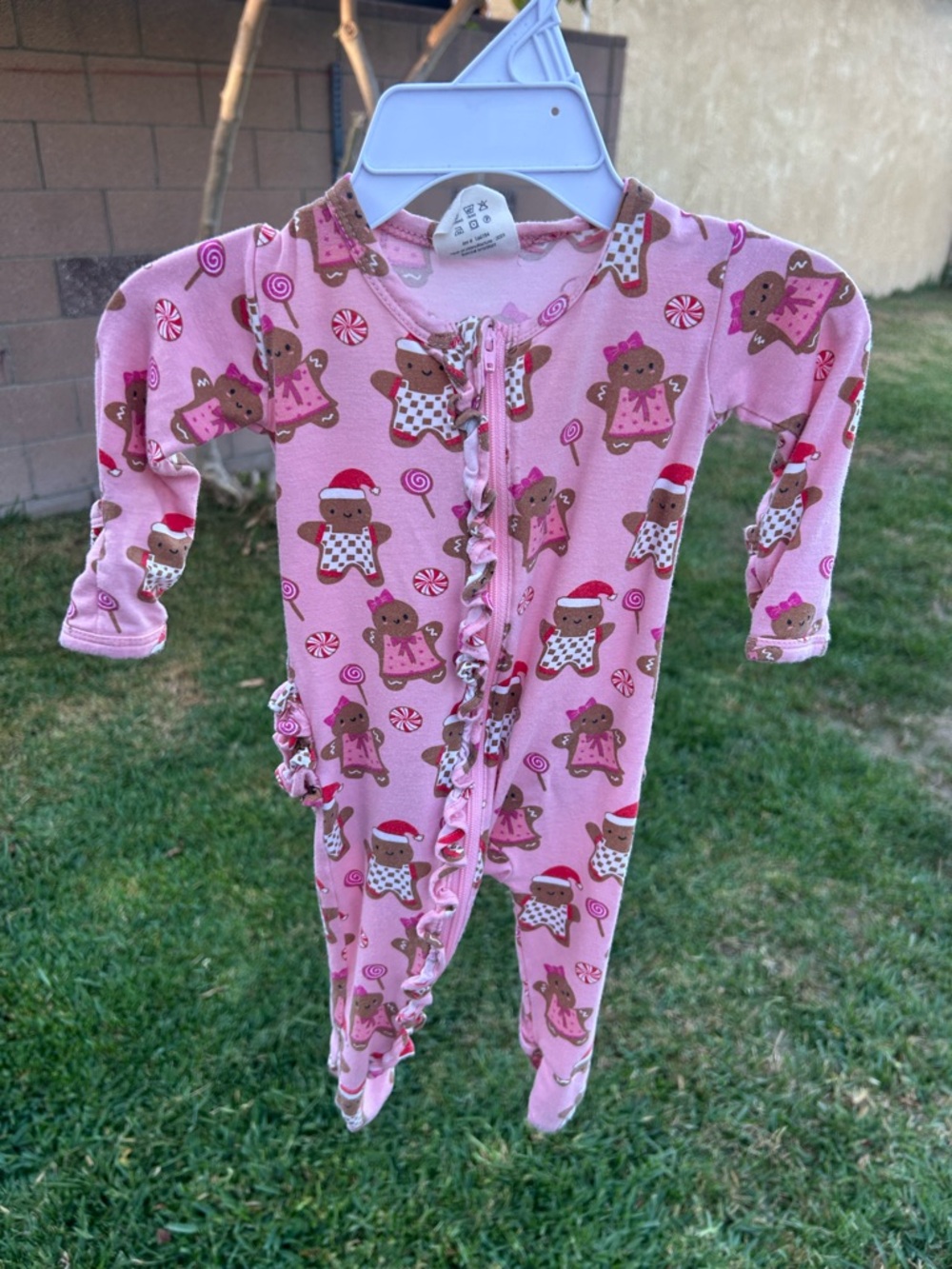 Pink Gingerbread Print Ruffle-Front Baby One-Piece Footie
